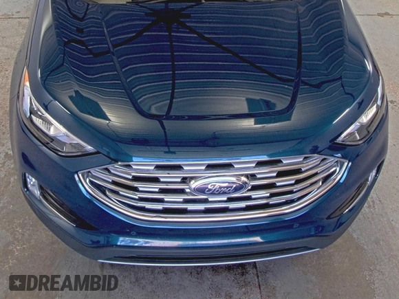 2020 Ford Edge Titanium z VIN 2FMPK3K91LBB37761, wystawiony jako IAAI lot #42829390 z przebiegiem 90 117 mil mil oraz . Historia ofert i sprzedaży dostępna na DreamBid. Obrazek 16.