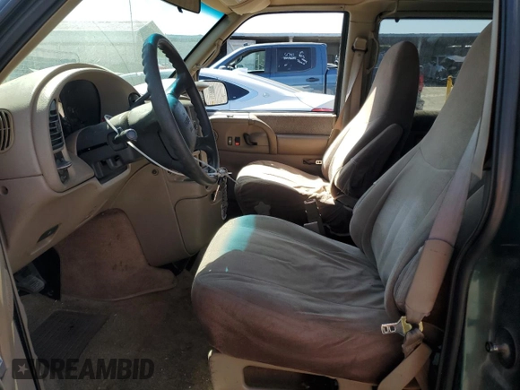 1998 GMC Safari z VIN 1GKEL19W6WB525088, wystawiony jako Copart lot #67982664 z przebiegiem 163 182 mil mil oraz Szkody całkowita. Historia ofert i sprzedaży dostępna na DreamBid. Obrazek 7.