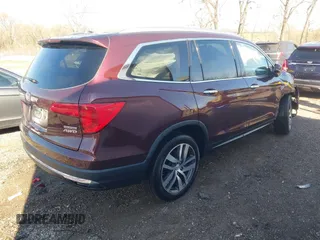 2016 Honda Pilot Touring with VIN 5FNYF6H90GB126572, listed as a IAAI auction lot 41872113 with 94,318 mi miles. Bid and sale history available at carsss.com. Image 4.