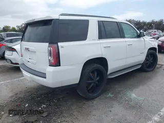 2017 GMC Yukon SLT with VIN 1GKS2BKC9HR125757, listed as a IAAI auction lot 42034182 with 72,333 mi miles. Bid and sale history available at carsss.com. Image 4.