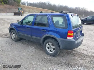 2006 Ford Escape XLT with VIN 1FMYU03146KB87070, listed as a IAAI auction lot 41451676 with 180,415 mi miles. Bid and sale history available at carsss.com. Image 3.