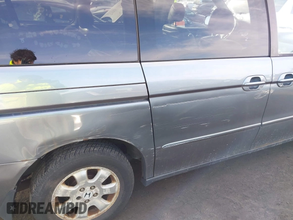 2002 Honda Odyssey EX-L z VIN 5FNRL180X2B022889, wystawiony jako IAAI lot #41546405 z przebiegiem 162 395 mil mil oraz . Historia ofert i sprzedaży dostępna na DreamBid. Obrazek 6.