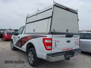 2021 Ford F-150 XL with VIN 1FTMF1CB7MKE81507, listed as a IAAI auction lot 41903595 with 71,860 mi miles and . Bid and sale history available at DreamBid. Image 3.