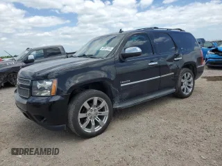 2011 Chevrolet Tahoe LTZ with VIN 1GNSCCE07BR131782, listed as a Copart auction lot 52981165 with 263,958 mi miles and Salvage title. Bid and sale history available at DreamBid. Image 1.