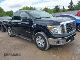 2017 Nissan Titan Platinum Reserve z VIN 1N6AA1E56HN522395, wystawiony jako IAAI lot #42333517 z przebiegiem 111 679 mil mil oraz . Historia ofert i sprzedaży dostępna na DreamBid. Obrazek 1.