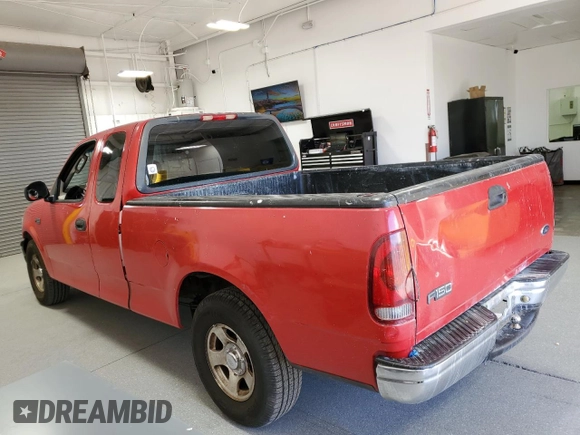 2002 Ford F-150 XL with VIN 1FTRX17212KE07302, listed as a Copart auction lot 49720995 with 205,171 mi miles and Clean Title. Bid and sale history available at carsss.com. Image 3.