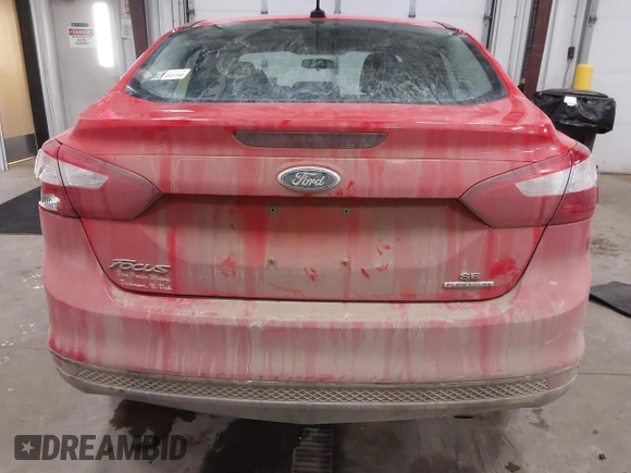 2013 Ford Focus SE z VIN 1FADP3F20DL352710, wystawiony jako IAAI lot #41549408 z przebiegiem 97 460 mil mil oraz . Historia ofert i sprzedaży dostępna na DreamBid. Obrazek 17.