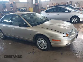 2002 Saturn SL with VIN 1G8ZK52792Z143191, listed as a IAAI auction lot 41831087 with 85,301 mi miles. Bid and sale history available at carsss.com. Image 1.