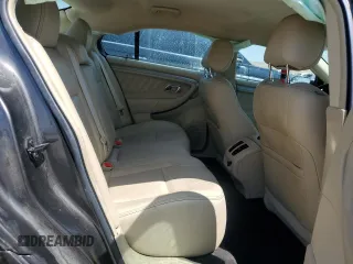 2015 Ford Taurus SEL с VIN 1FAHP2E87FG183122, выставлен на аукционе Copart как лот 62878955 с пробегом 94 374 миль миль и Списание • Salvage title. История ставок и продаж доступна на DreamBid. Изображение 10.