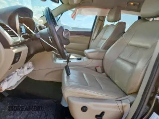 2014 Jeep Grand Cherokee Limited with VIN 1C4RJFBG9EC121990, listed as a Copart auction lot 64079495 with 98,615 mi miles and Salvage title. Bid and sale history available at DreamBid. Image 7.