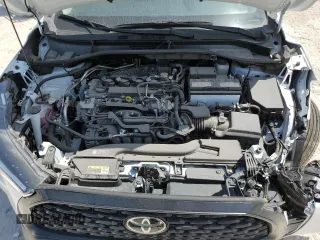 2024 Toyota Corolla Cross LE with VIN 7MUCAAAG7RV090677, listed as a Copart auction lot 57615565 with 6,910 mi miles and Salvage title. Bid and sale history available at DreamBid. Image 12.