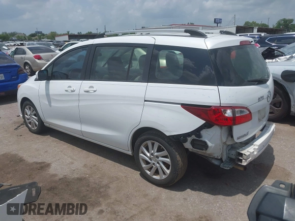 2012 Mazda 5 Sport with VIN JM1CW2BLXC0114770, listed as a IAAI auction lot 42147656 with 99,908 mi miles and . Bid and sale history available at DreamBid. Image 3.