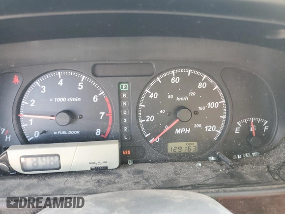 2002 Isuzu Rodeo S with VIN 4S2CK58W124307433, listed as a Copart auction lot 75447074 with 129,163 mi miles and Salvage title. Bid and sale history available at DreamBid. Image 9.
