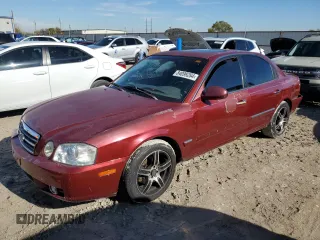 2005 Kia Optima LX z VIN KNAGD128X55415183, wystawiony jako Copart lot #84099284 z przebiegiem 114 962 mil mil oraz Szkoda całkowita • Salvage title. Historia ofert i sprzedaży dostępna na DreamBid. Obrazek 1.