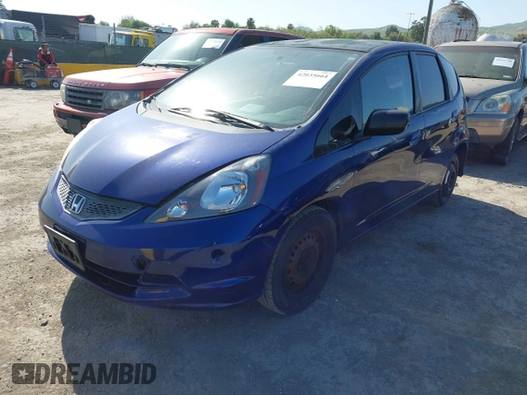 2009 Honda Fit with VIN JHMGE88279S071667, listed as a IAAI auction lot 42035664 with 235,791 mi miles. Bid and sale history available at carsss.com. Image 2.