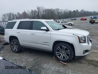 2019 GMC Yukon Denali with VIN 1GKS1CKJ7KR364240, listed as a IAAI auction lot 41645374 with 104,956 mi miles. Bid and sale history available at carsss.com. Image 13.