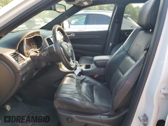 2014 Jeep Grand Cherokee Summit с VIN 1C4RJEJGXEC449558, выставлен на аукционе Copart как лот 59346845 с пробегом Не указан миль и Списание • Salvage title. История ставок и продаж доступна на DreamBid. Изображение 7.