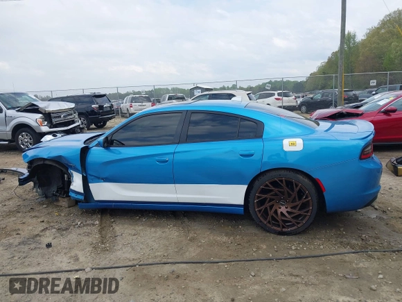 2015 Dodge Charger RT with VIN 2C3CDXCTXFH918878, listed as a IAAI auction lot 41953418 with 110,202 mi miles and . Bid and sale history available at DreamBid. Image 15.