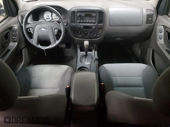 2005 Ford Escape XLS Value z VIN 1FMYU02Z55KA45705, wystawiony jako Copart lot #57244345 z przebiegiem Nie podano mil oraz Czysty tytuł • Clean title. Historia ofert i sprzedaży dostępna na DreamBid. Obrazek 8.