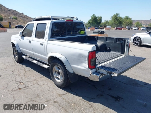 2000 Nissan Frontier XE with VIN 1N6ED27T5YC433357, listed as a IAAI auction lot 42405160 with 290,620 mi miles and . Bid and sale history available at DreamBid. Image 3.