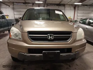 2004 Honda Pilot EX with VIN 2HKYF18464H567384, listed as a IAAI auction lot 41790773 with 142,534 mi miles. Bid and sale history available at carsss.com. Image 13.