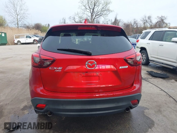 2016 Mazda CX-5 Grand Touring with VIN JM3KE4DY9G0865780, listed as a IAAI auction lot 41913914 with 76,579 mi miles. Bid and sale history available at carsss.com. Image 17.