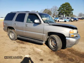 2003 GMC Yukon SLT z VIN 1GKEC13Z03R289219, wystawiony jako Copart lot #45911305 z przebiegiem Nie podano mil oraz Szkoda całkowita • Salvage title. Historia ofert i sprzedaży dostępna na DreamBid. Obrazek 4.