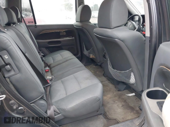 2006 Honda Pilot LX z VIN 5FNYF28136B049911, wystawiony jako IAAI lot #41463064 z przebiegiem 233 734 mil mil oraz . Historia ofert i sprzedaży dostępna na DreamBid. Obrazek 8.