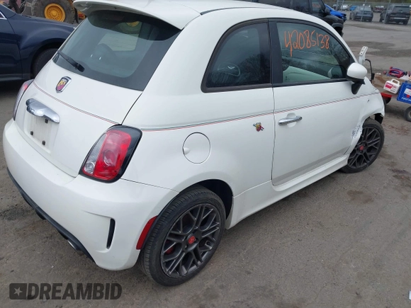 2015 FIAT 500 Abarth with VIN 3C3CFFFH1FT597459, listed as a IAAI auction lot 42085138 with 71,479 mi miles. Bid and sale history available at carsss.com. Image 4.