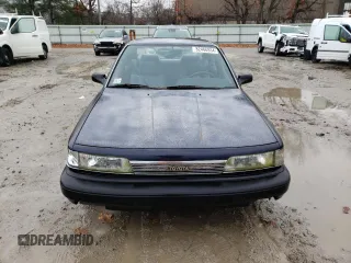 1989 Toyota Camry z VIN JT2SV21E6K3335385, wystawiony jako Copart lot #82466934 z przebiegiem 74 815 mil mil oraz Czysty tytuł • Clean title. Historia ofert i sprzedaży dostępna na DreamBid. Obrazek 5.