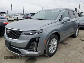 2023 Cadillac XT6 FWD Luxury with VIN 1GYKPAR47PZ147139, listed as a Copart auction lot 50783595 with 27,684 mi miles and Salvage Title. Bid and sale history available at DreamBid. Image 1.