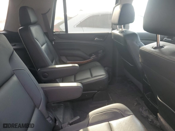 2019 Chevrolet Tahoe Premier with VIN 1GNSCCKJ4KR193590, listed as a Copart auction lot 74721004 with 93,710 mi miles and Salvage Title. Bid and sale history available at carsss.com. Image 10.