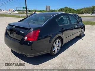 2004 Nissan Maxima SL with VIN 1N4BA41E94C883548, listed as a IAAI auction lot 42006917 with 158,277 mi miles. Bid and sale history available at carsss.com. Image 4.