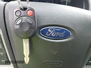 2012 Ford Fusion Hybrid z VIN 3FADP0L33CR289548, wystawiony jako IAAI lot #41905806 z przebiegiem 121 233 mil mil oraz . Historia ofert i sprzedaży dostępna na DreamBid. Obrazek 11.