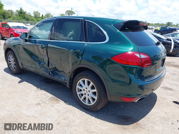 2014 Porsche Cayenne with VIN WP1AA2A21ELA06570, listed as a IAAI auction lot 42473298 with 61,421 mi miles and . Bid and sale history available at DreamBid. Image 3.