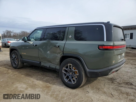 2022 Rivian R1S Launch Edition z VIN 7PDSGABL4NN000393, wystawiony jako Copart lot #44218005 z przebiegiem 26 598 mil mil oraz Szkoda całkowita • Salvage title. Historia ofert i sprzedaży dostępna na DreamBid. Obrazek 2.