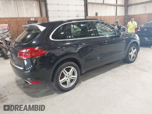 2014 Porsche Cayenne Diesel with VIN WP1AF2A25ELA45518, listed as a IAAI auction lot 42537736 with 210,836 mi miles and . Bid and sale history available at DreamBid. Image 4.