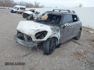 2012 MINI Countryman S with VIN WMWZC3C56CWM26958, listed as a IAAI auction lot 41765541 with Not Provided miles and . Bid and sale history available at DreamBid. Image 2.