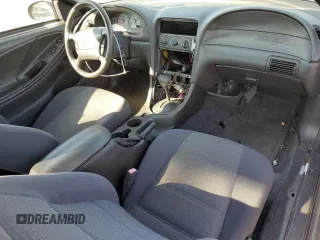 2004 Ford Mustang Standard z VIN 1FAFP40654F138305, wystawiony jako Copart lot #65882195 z przebiegiem 89 404 mil mil oraz Czysty tytuł • Clean title. Historia ofert i sprzedaży dostępna na DreamBid. Obrazek 8.