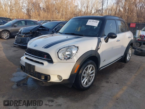 2015 MINI Cooper Countryman S with VIN WMWZC5C50FWP42324, listed as a IAAI auction lot 41795698 with 95,746 mi miles. Bid and sale history available at carsss.com. Image 17.