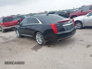2017 Cadillac XTS Luxury with VIN 2G61M5S38H9151248, listed as a IAAI auction lot 42111780 with 76,494 mi miles. Bid and sale history available at carsss.com. Image 3.
