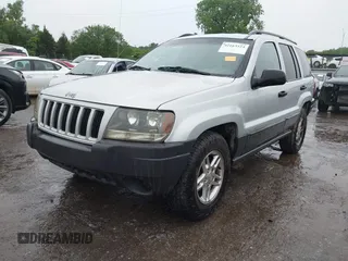2004 Jeep Grand Cherokee Laredo z VIN 1J4GW48S64C132172, wystawiony jako IAAI lot #42163524 z przebiegiem 170 952 mil mil oraz . Historia ofert i sprzedaży dostępna na DreamBid. Obrazek 18.