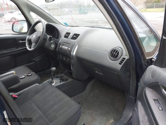 2010 Suzuki SX4 with VIN JS2YB5A37A6300142, listed as a IAAI auction lot 41956392 with 91,808 mi miles. Bid and sale history available at carsss.com. Image 5.