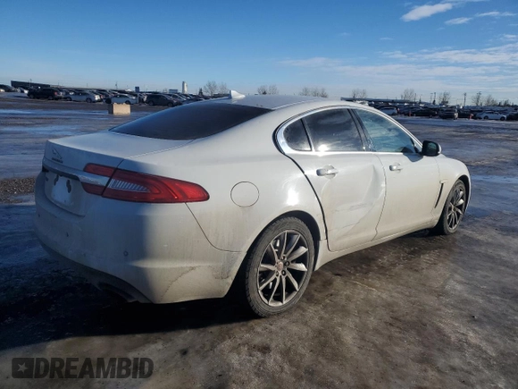 2015 Jaguar XF with VIN SAJXA0FS5FPU49437, listed as a Copart auction lot 84757254 with 99,301 mi miles and Salvage Title. Bid and sale history available at DreamBid. Image 3.