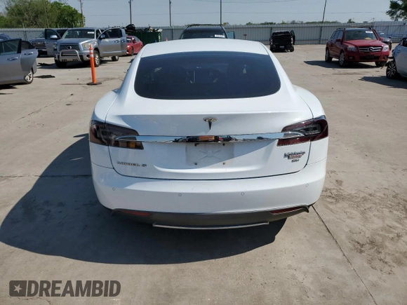 2014 Tesla Model S 60 с VIN 5YJSA1H16EFP45983, выставлен на аукционе Copart как лот 52256635 с пробегом 159 948 миль миль и Списание • Salvage title. История ставок и продаж доступна на DreamBid. Изображение 6.