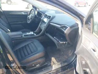 2019 Ford Fusion SEL with VIN 3FA6P0MU5KR203851, listed as a IAAI auction lot 41982637 with 96,954 mi miles and . Bid and sale history available at DreamBid. Image 5.