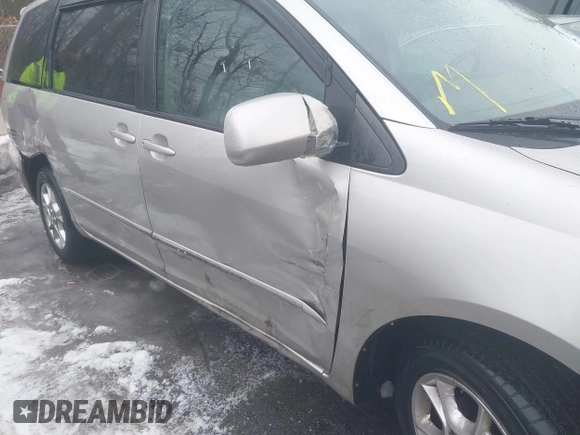2004 Toyota Sienna XLE z VIN 5TDBA22C74S014781, wystawiony jako IAAI lot #41327692 z przebiegiem 148 548 mil mil oraz . Historia ofert i sprzedaży dostępna na DreamBid. Obrazek 6.