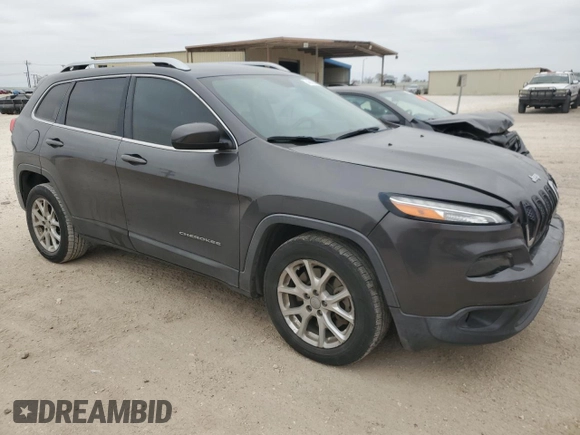 2015 Jeep Cherokee Latitude with VIN 1C4PJLCB1FW643005, listed as a Copart auction lot 46163045 with 134,840 mi miles and Salvage Title. Bid and sale history available at DreamBid. Image 4.