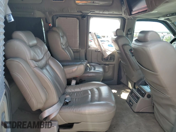 2006 Chevrolet Express Passenger z VIN 1GBFG15T161154772, wystawiony jako Copart lot #51090025 z przebiegiem 114 152 mil mil oraz Szkoda całkowita • Salvage title. Historia ofert i sprzedaży dostępna na DreamBid. Obrazek 11.