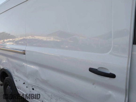 2023 Ford Transit Cargo with VIN 1FTBR1C8XPKC07287, listed as a IAAI auction lot 41247582 with 12,776 mi miles and . Bid and sale history available at DreamBid. Image 8.